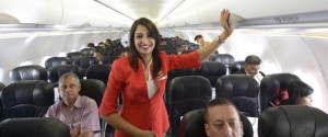 NEW DELHI,INDIA MAY 20: Air Hostess inside the Aeroplane during the launch of Air Asia flight at IGI AirportT3, New Delhi.(Photo by Chandradeep Kumar/India Today Group/Getty Images)