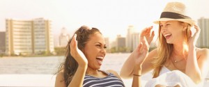 Women laughing together on boat