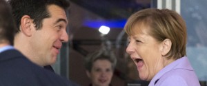 German Chancellor Angela Merkel, right, and Greek Prime Minister Alexis Tsipras share a laugh at the start of a second working session of a summit on migration between European and African leaders, in Valletta, Malta, Thursday, Nov. 12, 2015. (AP Photo/Alessandra Tarantino)