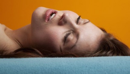 New York State, USA --- Studio shot of young woman having orgasm --- Image by © WIN-Images/Corbis