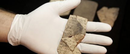 Letters inscribed on pottery, known as ostracons, which were unearthed in an excavation of a fort in Arad, Israel, and dated to about 600 B.C. shortly before Nebuchadnezzar’s destruction of Jerusalem, are seen in Israel Museum in Jerusalem Tuesday, April 12, 2016. A Tel Aviv University team determined that this famous hoard of ancient Hebrew inscriptions was written by at least six different authors. Although the inscriptions are not from the Bible, their discovery suggests there was widespread literacy in ancient Judah at the time that would support the composition of biblical works. (AP Photo/Dan Balilty)